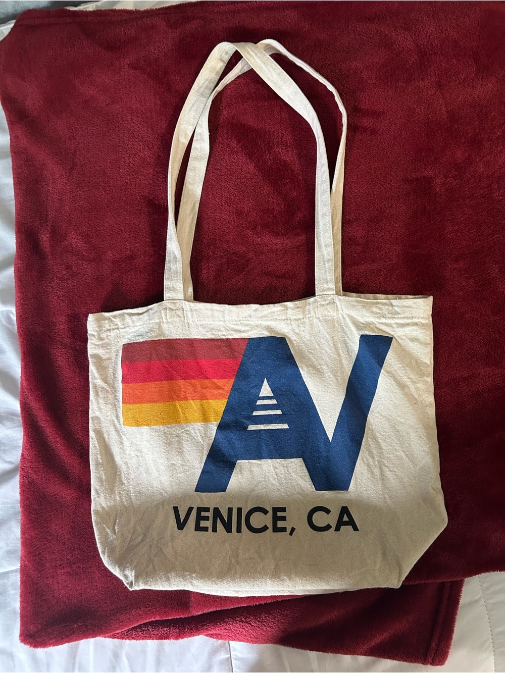 Aviator Nation Cream Tote with Blue Logo and Rainbow Stripe